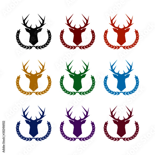 Hunting trophy. Deer head with big antlers in laurel wreath, color set