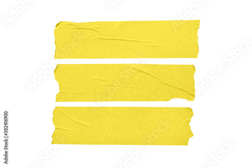 Set of yellow blank tape stickers isolated on white background photo