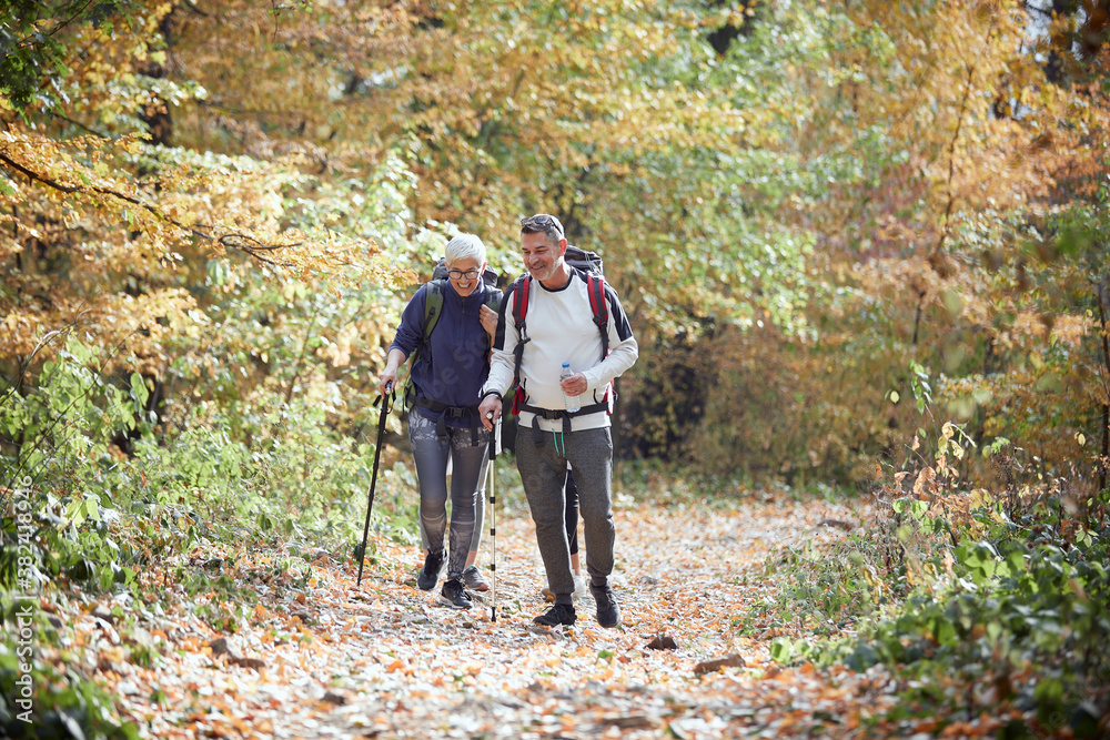 Senior couple hiking; Active retirment concept