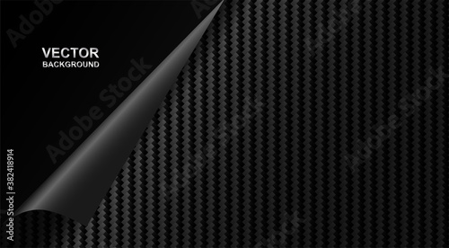 Abstract. Black carbon fiber background. light and shadow. Vector.