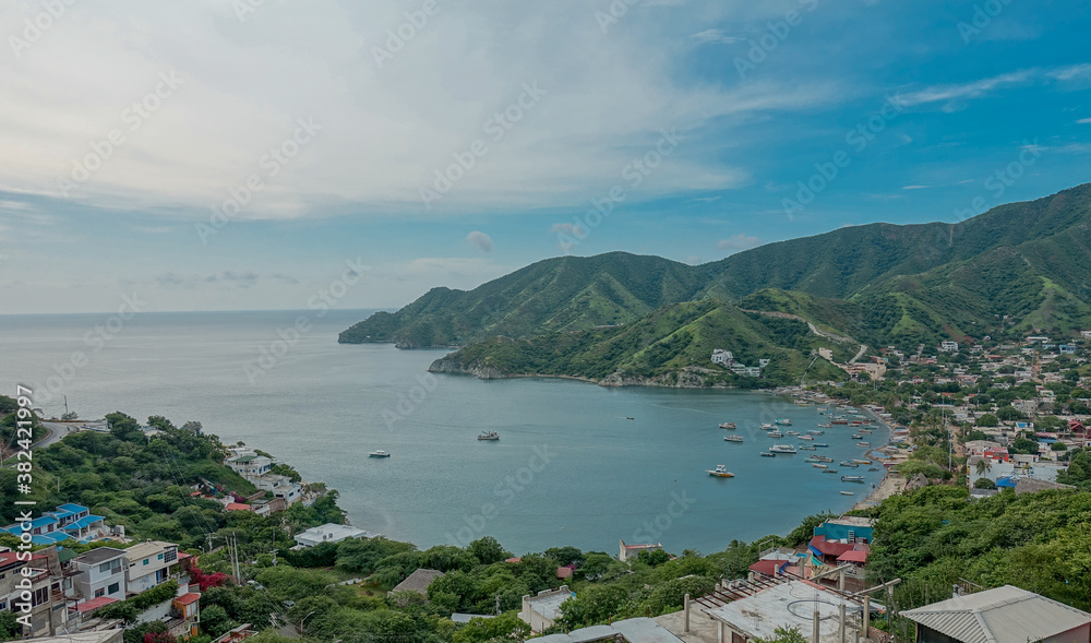 The paradisaical bay and a view over the whole touristic fishing village of Taganga near Santa Marta, Colombia 2020