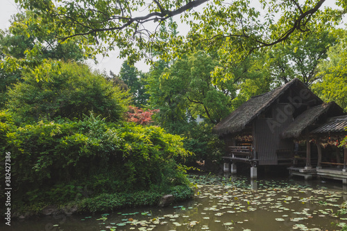 Chinese architecture by water in Shenyuan (Shen Garden) scenic area in Shaoxing, China