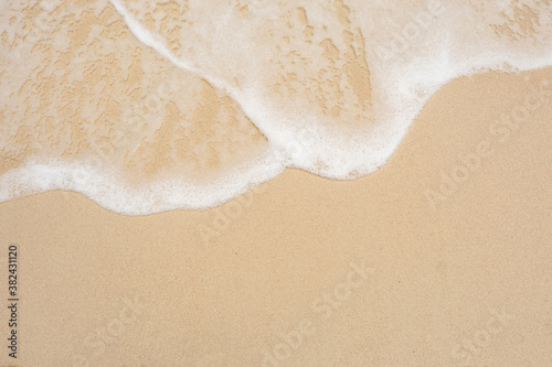 wave on sand beach top view