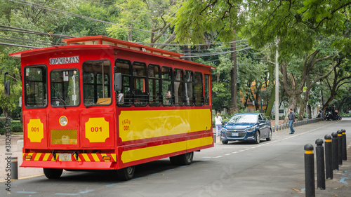 Red and Yellow Trolley Car on the Streets of Coyoacan
