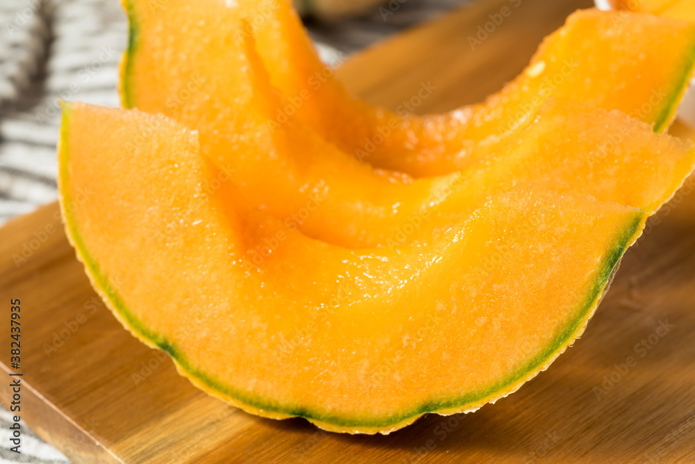 Raw Orange Organic Cantaloupe Fruit Raw Orange Organic Cantaloupe Fruit