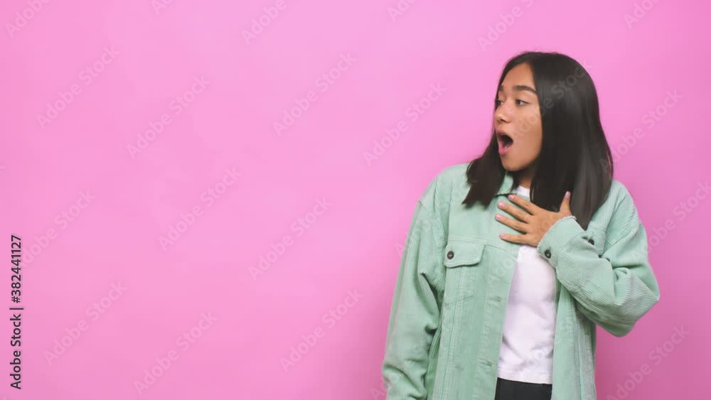 Young mixed race indian woman being shocked because of something she has seen Young mixed race indian woman being shocked because of something she has seen
