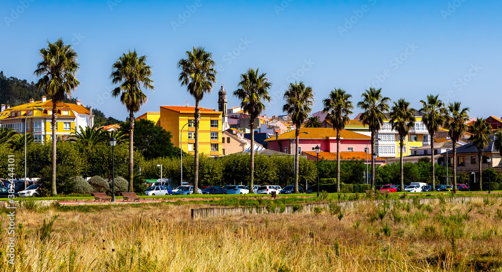 View of colorful buildings in the coastal town of Cariño, in the Galicia region of Spain.