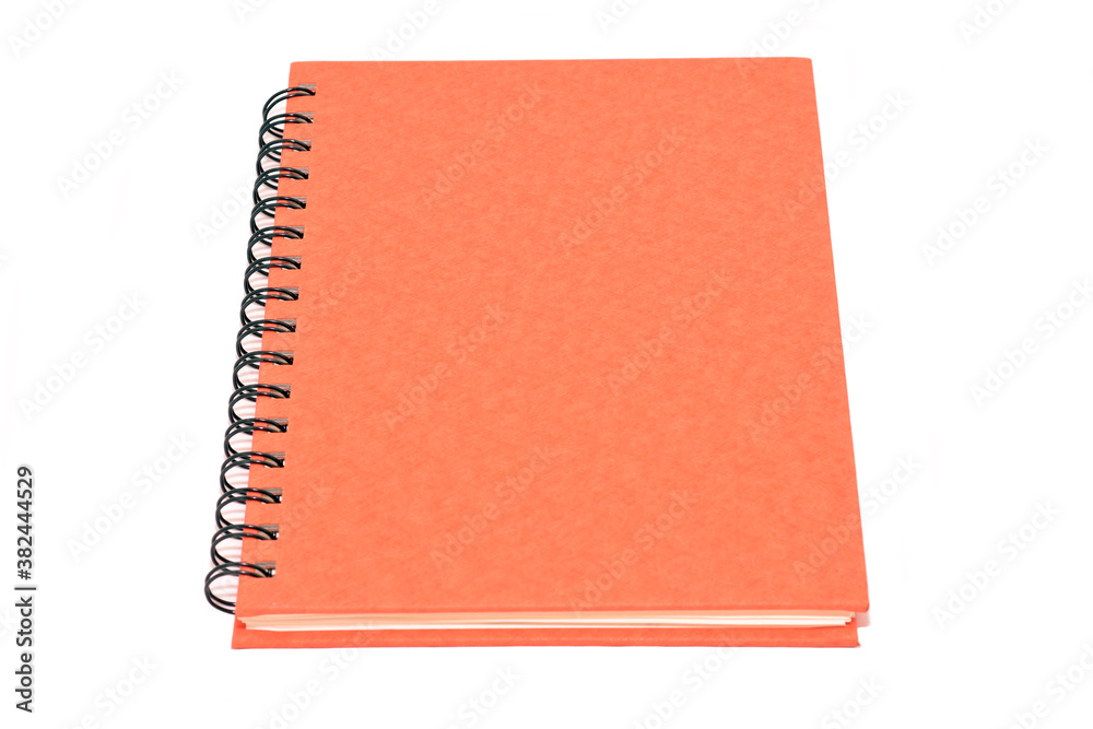 Orange notebook isolated on white background