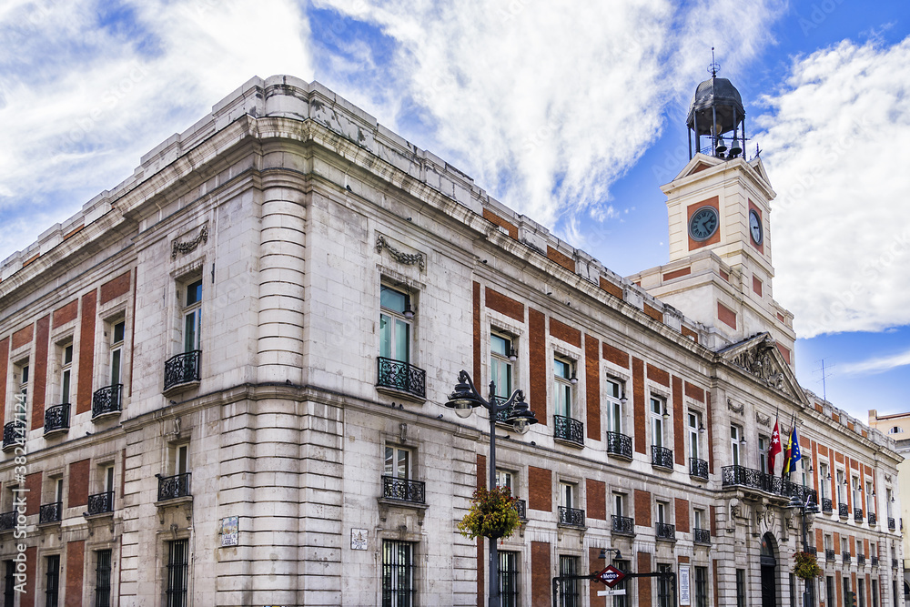 View of House of the Post Office (Real Casa de Correos) with Clock Tower - an eighteenth century (1768) building in Puerta del Sol, Madrid. Spain.