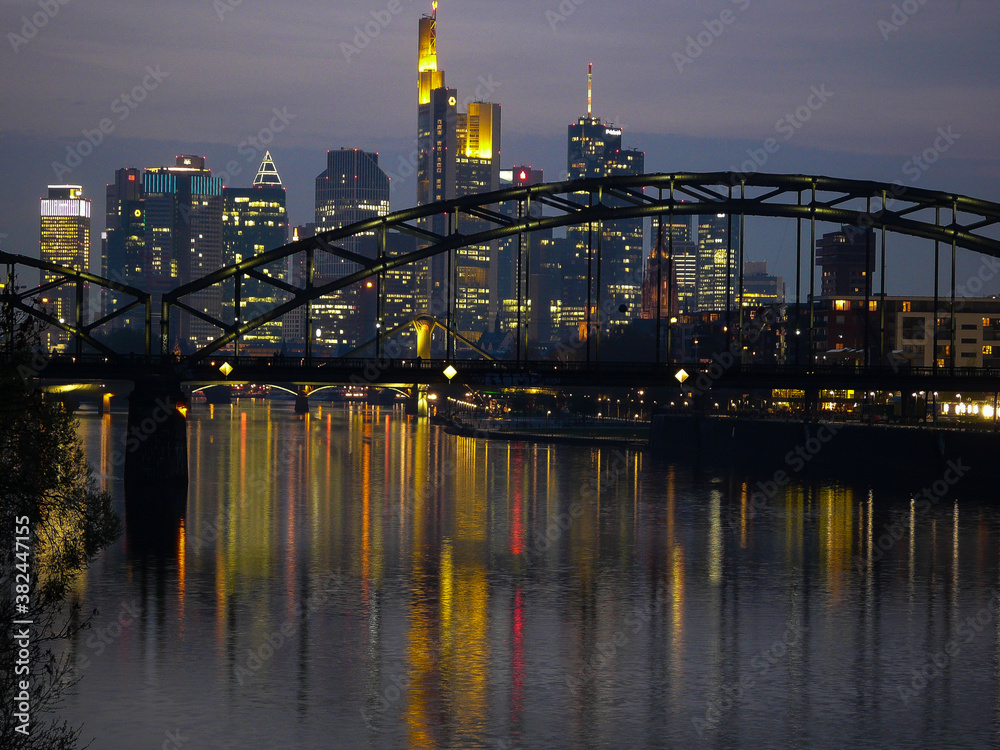 Fototapeta premium Colorful sunset over downtown Frankfurt and the river Main