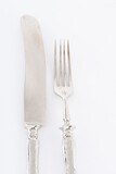 silver fork an knife on a white background