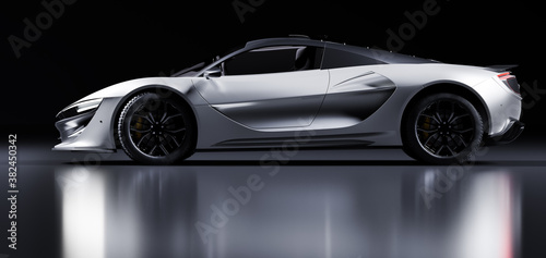 Side view of modern fast sports car in studio light