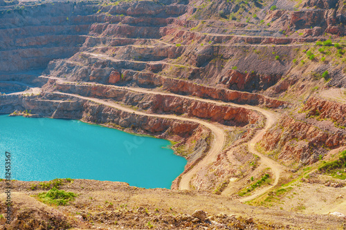 Mine quarry of diamond industry. Open cut rock on limestone Kadykovsky quarry, Balaklava, Crimea.  photo