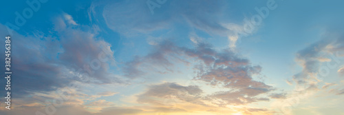 Sunset sky panorama. Blue sky with clouds and sun, beautiful landscape panorama skyline background
