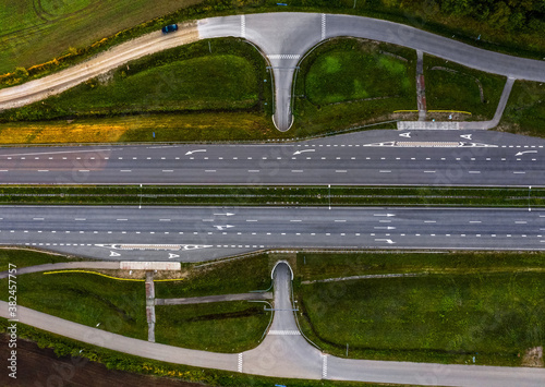 Картината върху платно Aerial view of a highway with road markings,