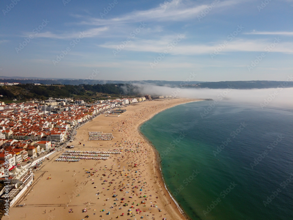 View of Nazare Beach, from the viewpoint of Suberco, in the Leiria District, in Portugal. View of Nazare Beach, from the viewpoint of Suberco, in the Leiria District, in Portugal.