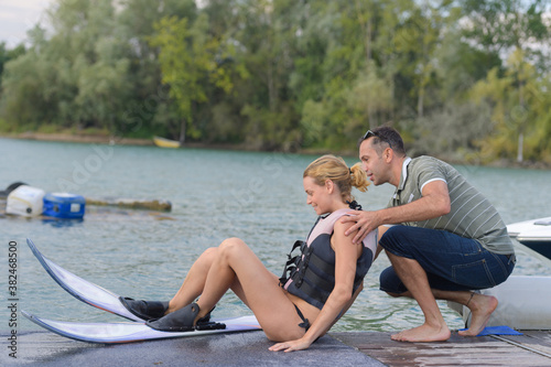 she is learning waterski with instructor