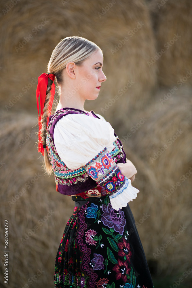 Young beautiful slovak woman in traditional costume. Slovak folklore. Young beautiful slovak woman in traditional costume. Slovak folklore.