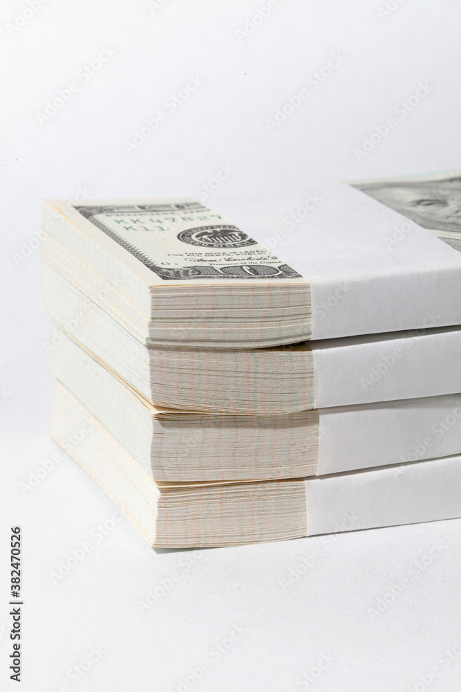 Stack of dollar bills on white. Stack of dollar bills on white.