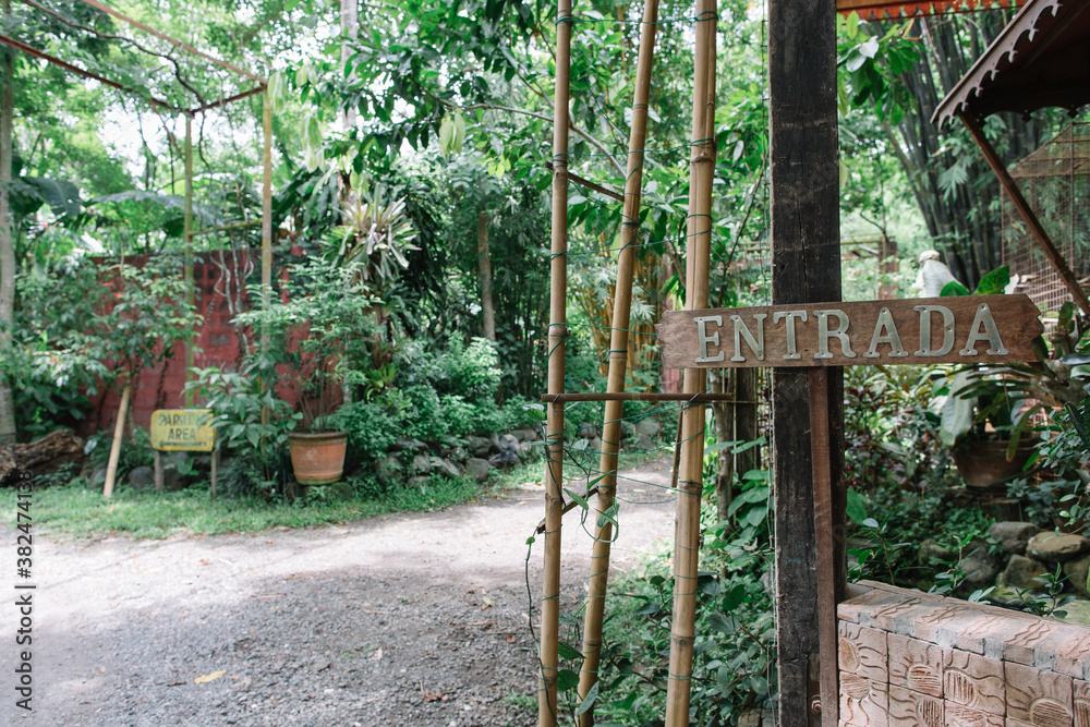 Entrance sign to a restaurant in a rural area Entrance sign to a restaurant in a rural area