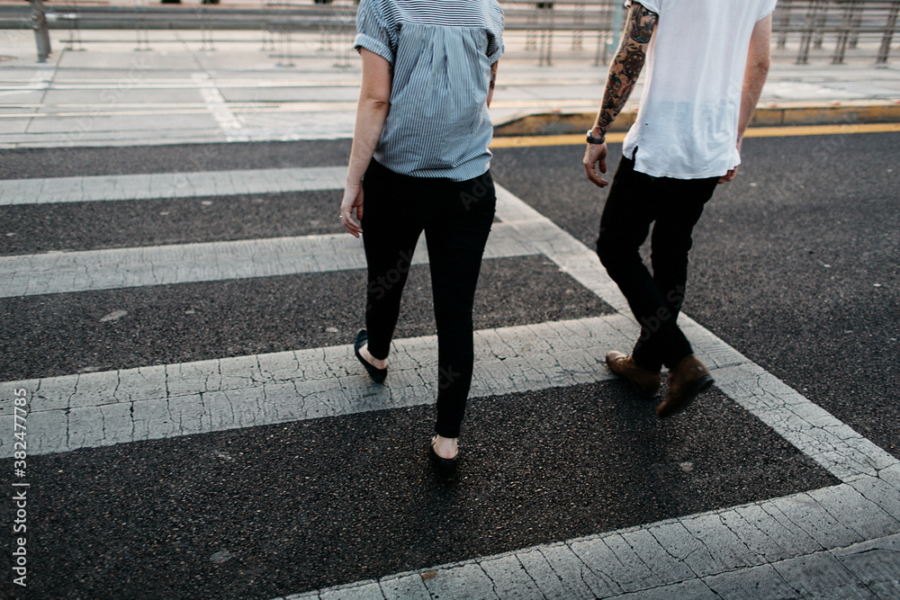 custom made wallpaper toronto digitalMan and woman walking across the street