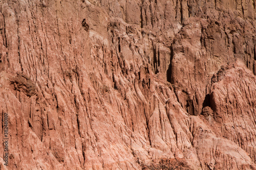 Geology. Natural texture and pattern. closeup view of the red sandstone and rock face in the desert. 