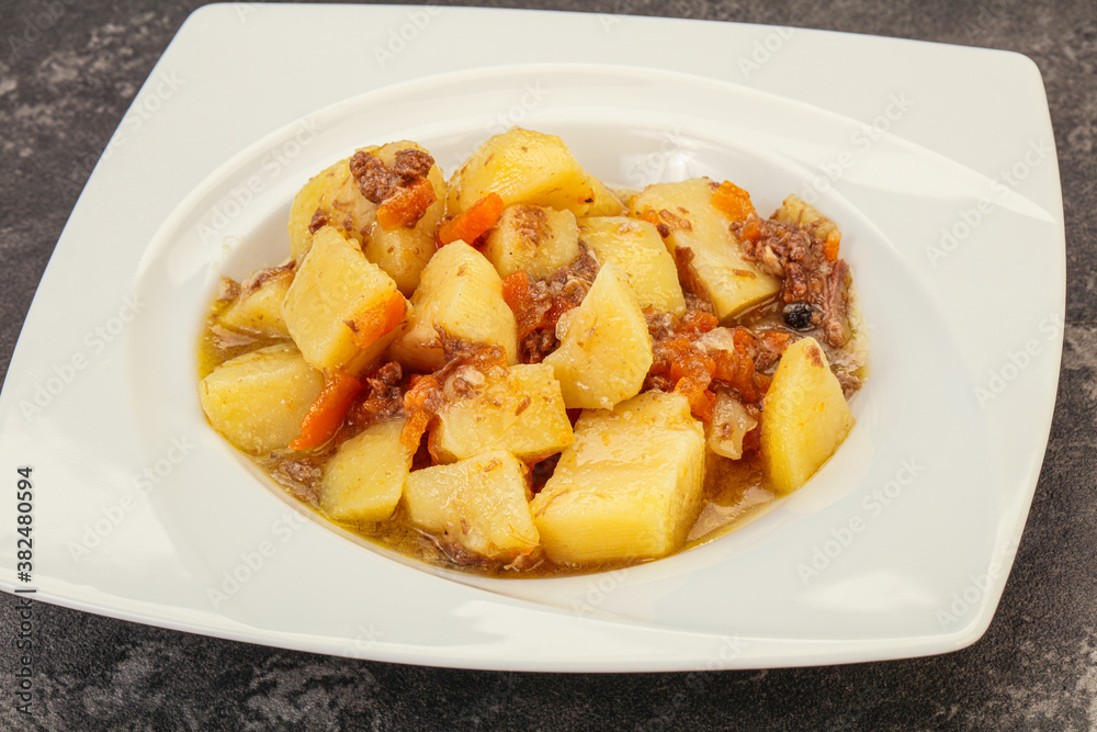 Roasted potato and beef with sauce Roasted potato and beef with sauce
