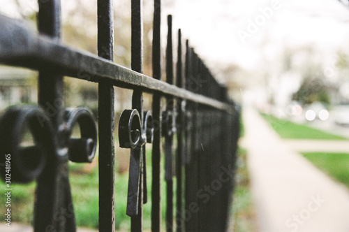 Wrought iron fence on a street