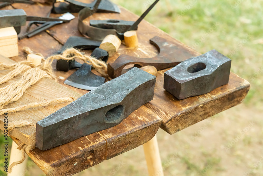 repair tool hammer and ax iron head, blacksmith's desk repair tool hammer and ax iron head, blacksmith's desk