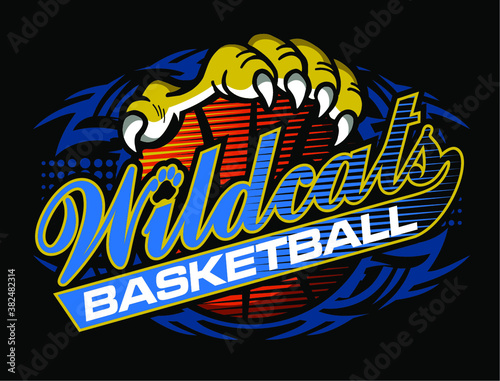 tribal wildcats basketball team design in script with large claw holding ball for school, college or league
