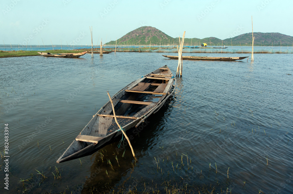 Fishing boat resting in a big lake,India Fishing boat resting in a big lake,India