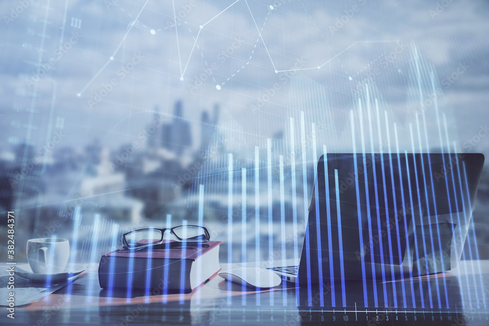 Double exposure of financial chart drawings and desk with open notebook background. Concept of forex market Double exposure of financial chart drawings and desk with open notebook background. Concept of forex market
