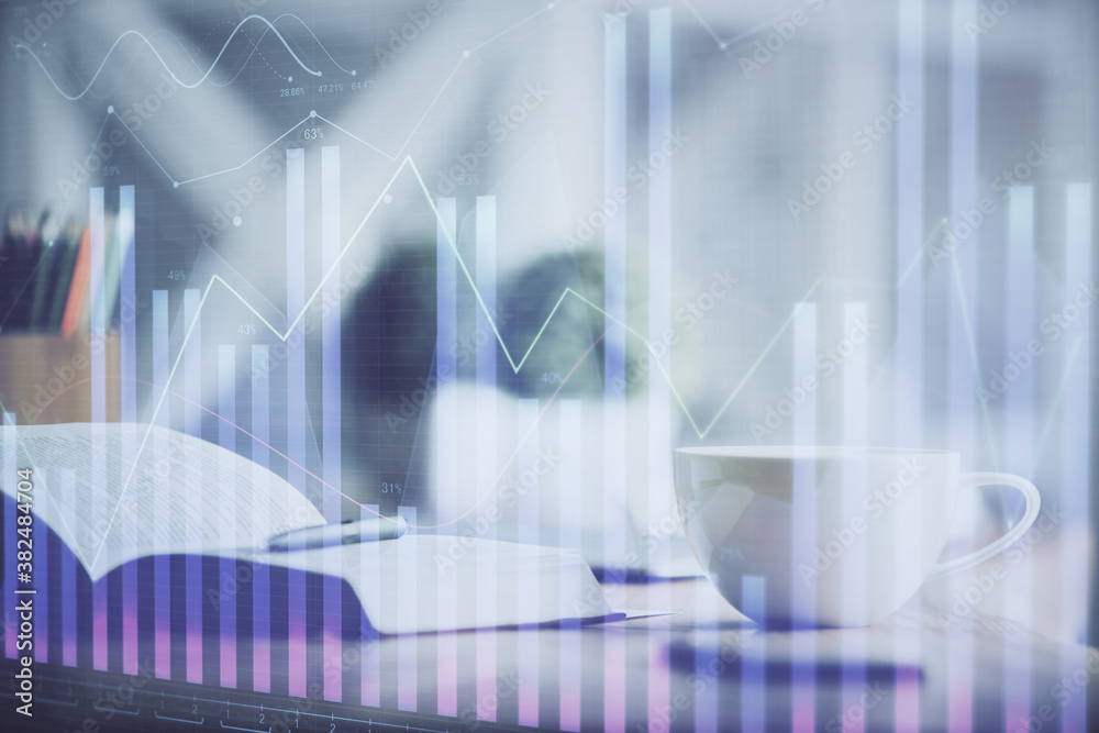 Multi exposure of forex graph drawing and desktop with coffee and items on table background. Concept of financial market trading