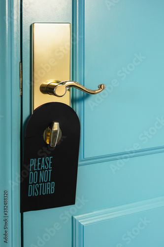 Do Not Disturb Sign Hanged on a Knob