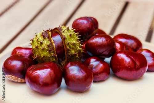 chestnuts on a wooden background