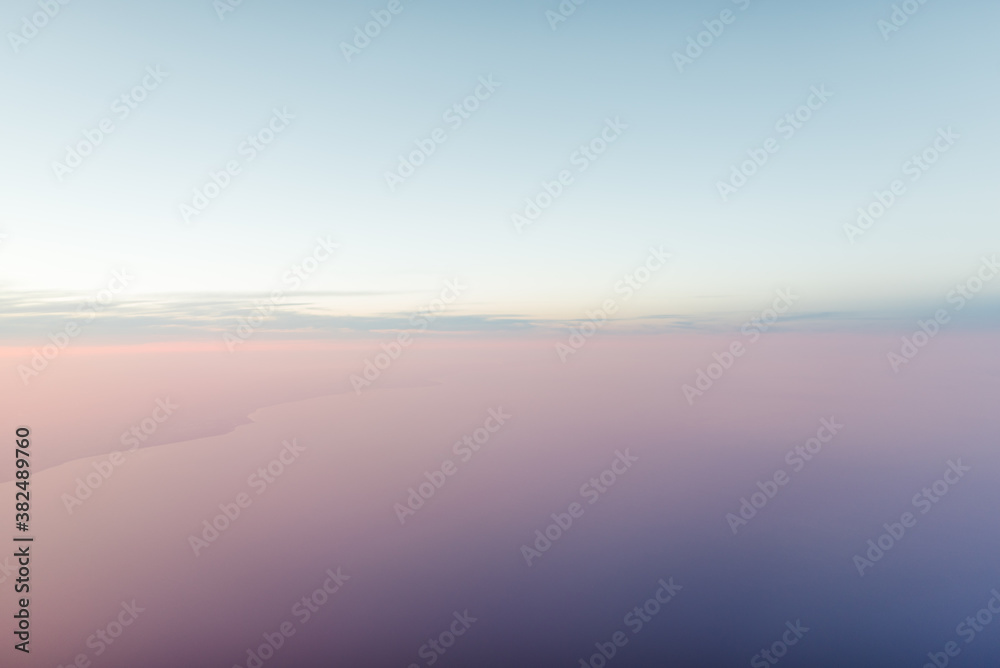 The sun setting from an airplane