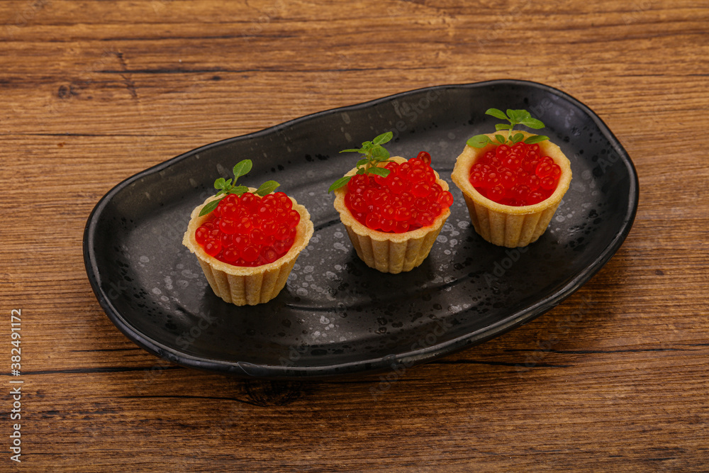 Apetizer - tartlet with red caviar Apetizer - tartlet with red caviar