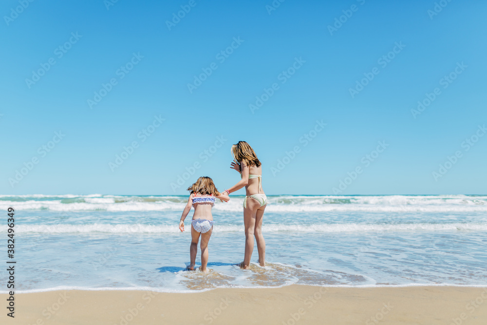 Little Sisters Walking into the Sea Little Sisters Walking into the Sea