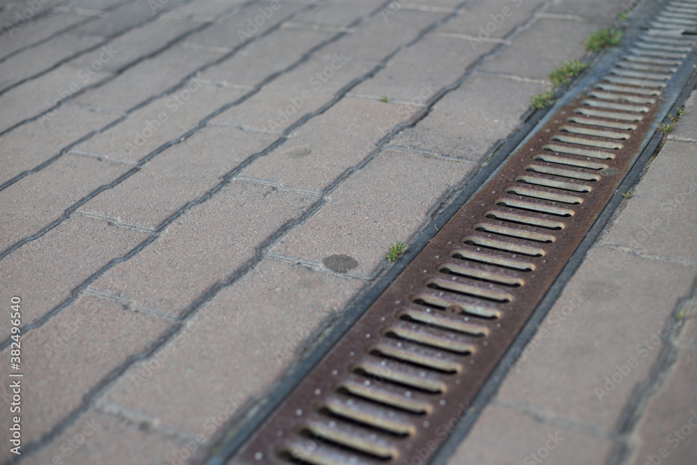 Storm drain for rain and ground water from impervious surfaces