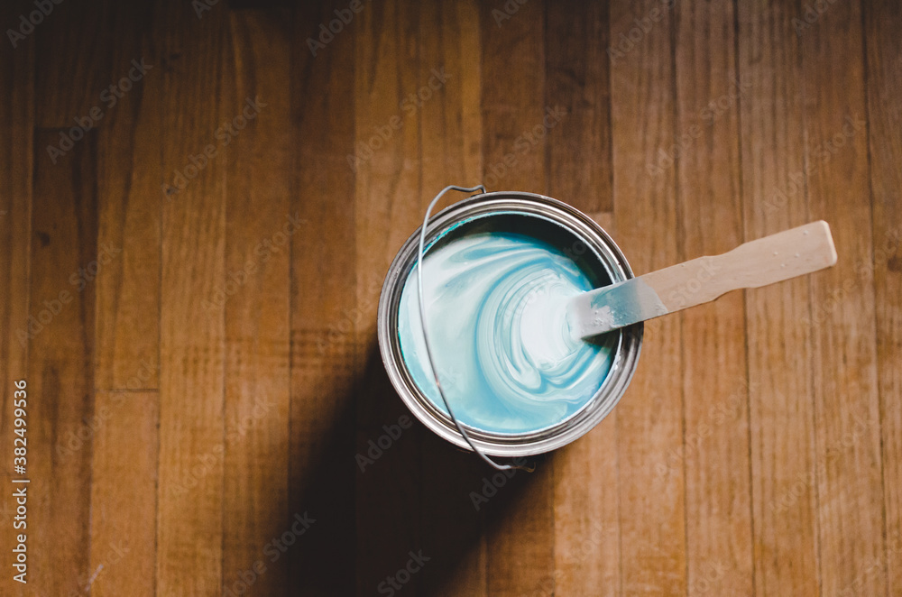 Freshly swirled paint in a paint can Freshly swirled paint in a paint can