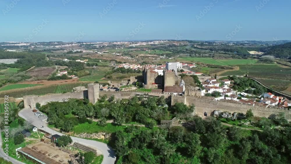 Aerial around view of medieval town Obidos with wall and fortress, Portugal, 4k Aerial around view of medieval town Obidos with wall and fortress, Portugal, 4k