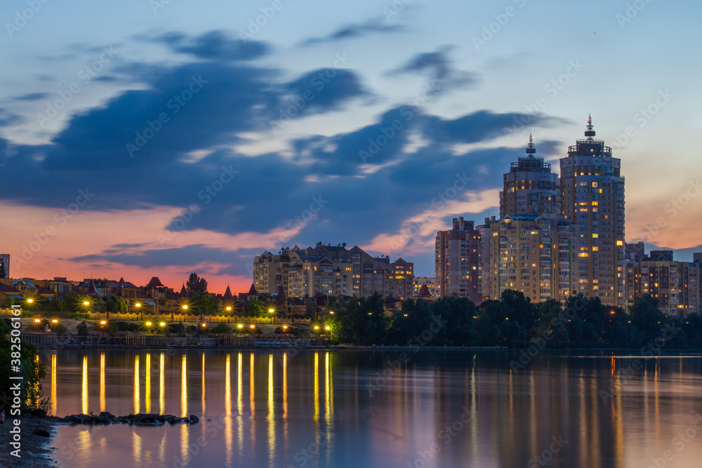 Bright night embankment on the banks of the Dnieper on Obolon Bright night embankment on the banks of the Dnieper on Obolon