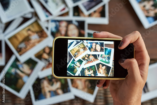 Smartphone snapshot of polaroid photos.