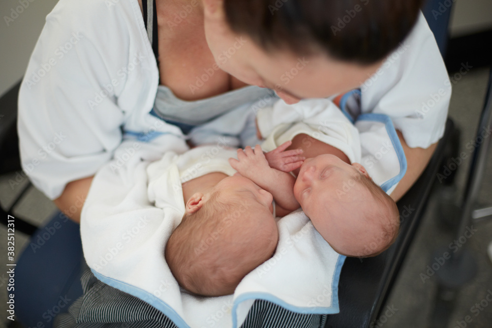 Mother with premature newborn twins Mother with premature newborn twins