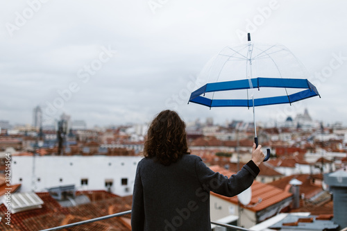 woman with a transparent ubrella photo