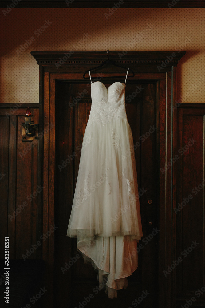 Wedding Dress in a Doorway Wedding Dress in a Doorway