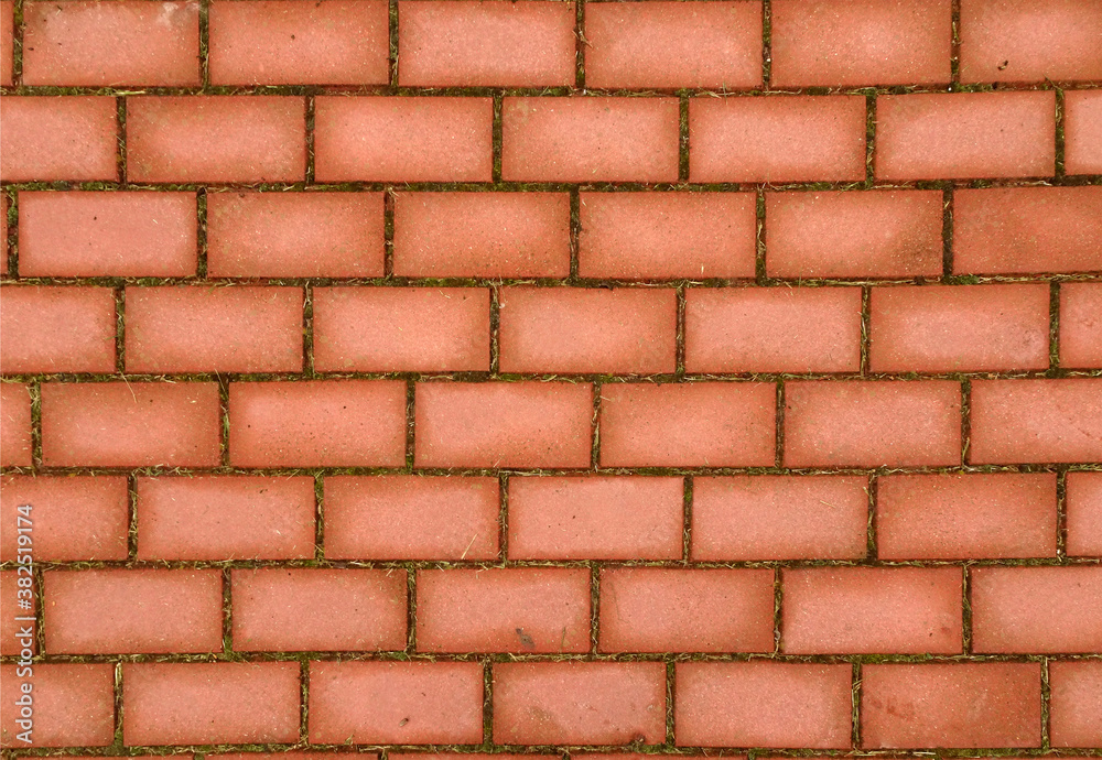 Obraz premium abstract geometric background paved with red brick, selective focus