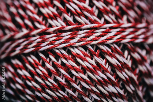 Detail of a Red and White Striped Thread