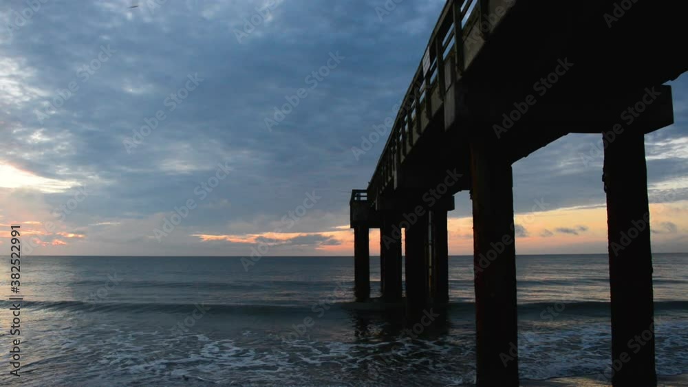 St. Augustine Pier wide sunset at the beach St. Augustine Pier wide sunset at the beach