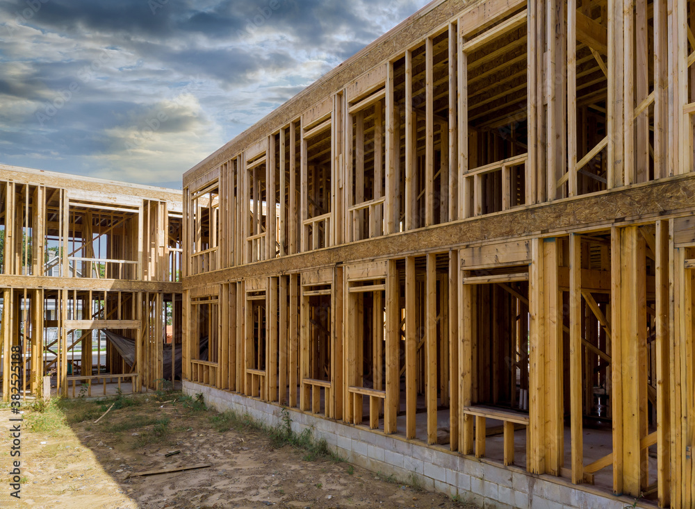 Building of New Home Construction exterior wood beam construction Building of New Home Construction exterior wood beam construction
